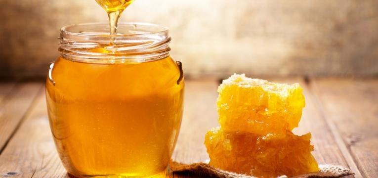 o mel é um dos alimentos para ficar feliz